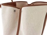 a close up of a bag with a handle on it