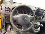 a steering wheel and dashboard of a small car