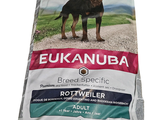 a bag of dog food that is on the ground