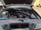 an image of a car with its hood open