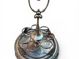 an image of a silver plate with a heart on it