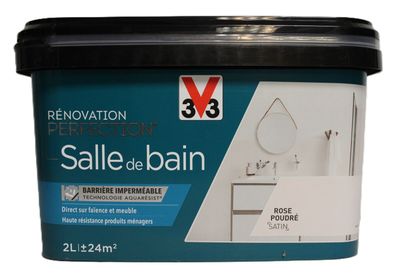 un pot de peinture de rénovation avec un couvercle noir sur fond blanc