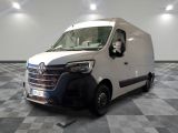 a white van that is sitting on a checkered floor