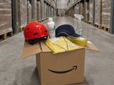 a cardboard box with a helmet and other items in it