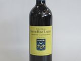 a bottle of wine that is sitting on a table