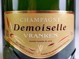 a close up of a bottle of champagne on a table