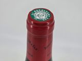 a bottle of wine that is sitting on a table