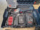 a tool box with tools inside of it on a table