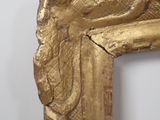 a picture of a gold picture frame with a bird on it