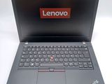 the lenovo laptop is open and ready to be used