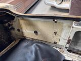 an old car that has been left in the garage