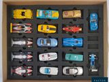 a box full of toy cars that are in it