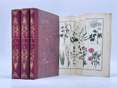 two books that are sitting side by side on a white surface
