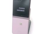 a phone that is sitting on top of a stand