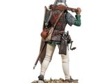 statue of a man with a sword and a helmet on a wooden base