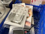 a blue basket with a digital scale in it