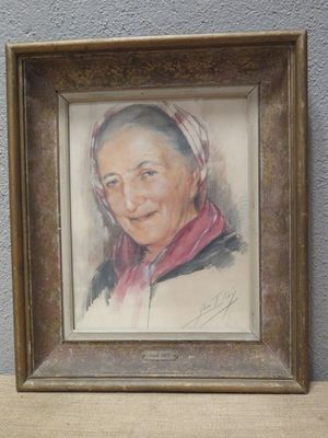 tableau représentant une femme portant un foulard rouge, dans un cadre en bois
