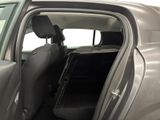 a car with the door open and the passenger seat down