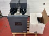 a stove and a box on a pallet in a garage