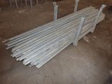 a pile of steel rods sitting on the ground