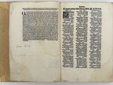 an open book with a black and white image on it