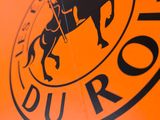 an image of a close up of a sign with a horse and rider on it