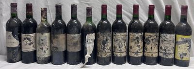 several bottles of wine are lined up in a row on a table