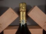 a bottle of wine that is sitting on a table