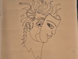 le dessin d'un homme avec une crête iroquoise sur une feuille de papier