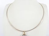 a close up of a necklace on a mannequin mannequin mannequin mannequin mannequin mannequin mannequin mannequin