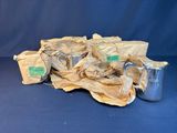 a pile of bags and cups on a blue background