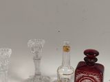 a lot of glass items that are sitting on a table