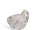 a picture of a white marble bird on a white background