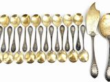 a lot of spoons and spoon spoons on the table
