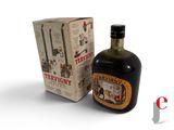 a bottle of liquor that is next to a box