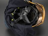 an open fire helmet with a fire hose attached to the side of it