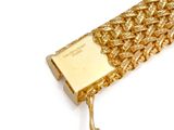 bracelet with a gold plated clasp on a white background