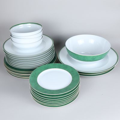 several plates and bowls are stacked on top of each other