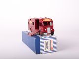 a toy truck that is sitting on top of a box