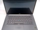 a laptop computer with a keyboard on the top of it