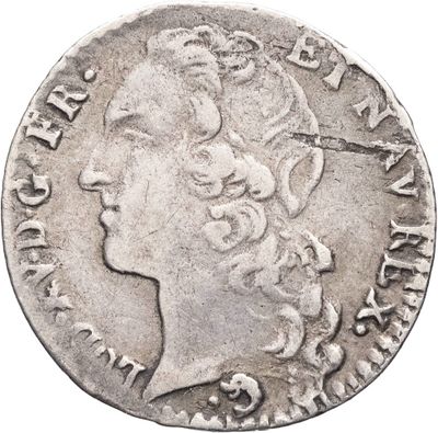 une pièce d'argent portant une tête de femme et une couronne