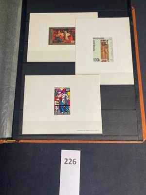 a picture of a collection of stamps on display on a table