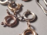 a close up of a bunch of charms on a table