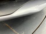 a close up of a car ' s front bumper