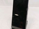 an image of a cell phone on a stand on a table