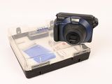 someone is taking a picture of a camera in a clear case