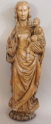 statue of a woman holding a child in her arms