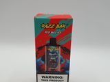 une boîte de vapeur rouge et noire posée sur une table blanche