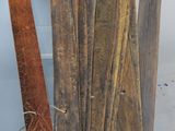 several pieces of wood are sitting on a table next to each other