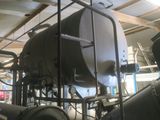 a large tank that is sitting inside of a building